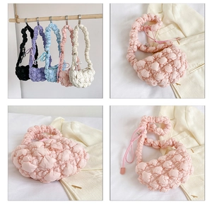 Detail of colorful bubble textured bags with ribbon bows and quilted shoulder straps