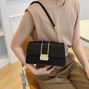 Black crocodile pattern shoulder bag with gold chain strap and rectangular metal lock