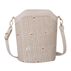 Sac seau tissé beige d'été avec broderie marguerite et bandoulière en cuir souple