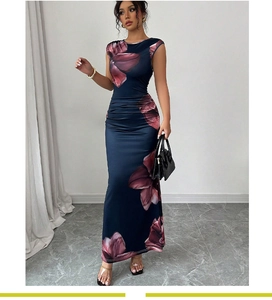 Detail of the elegant ruched waist design on the floral print sleeveless maxi dress