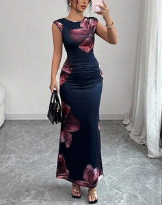 Detail of floral print pattern and side ruching on the sleeveless bodycon maxi dress