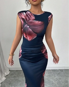 Detail of ruched waist design on a navy blue floral print sleeveless maxi dress