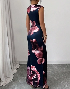 Detail of slim fit back design on navy sleeveless floral maxi dress with large prints