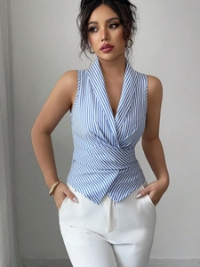Detail of blue and white striped sleeveless shirt with tie-waist wrap design