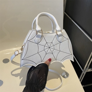 White bat-shaped PU handbag with spider web embroidery and gold hardware