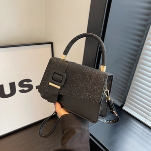 Minimalist black sequin and leather crossbody handbag with gold hardware for women