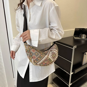 Ethnic knit moon shoulder bag with geometric patterns and adjustable nylon strap for women