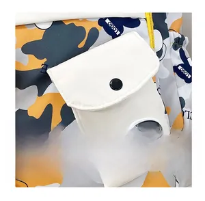 Close-up of camouflage backpack featuring a white canvas front pocket with FASHION label