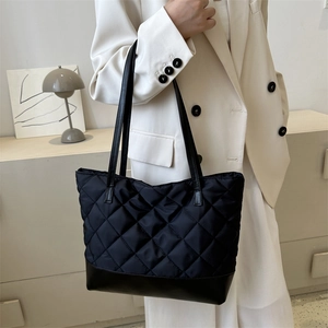 Chic black quilted oxford tote bag with large capacity and elegant diamond stitching