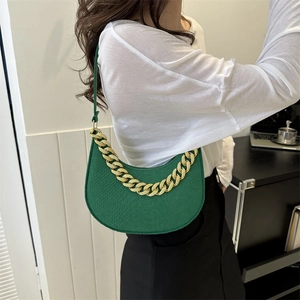 Chic dark green crocodile embossed crescent shoulder bag with bold gold chain decoration