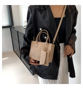 Beige quilted crossbody bag and mini pouch shown in a stylish lifestyle interior setting