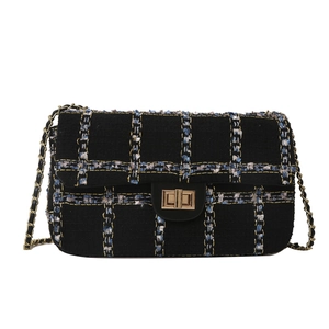 Sac à bandoulière classique en tweed noir avec fermoir doré et bandoulière en chaîne