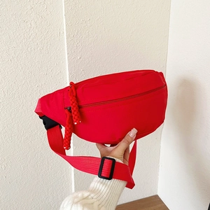 Chic solid red nylon crossbody chest bag with adjustable strap and textured finish