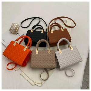 Quilted crossbody bags in five colors with woven handles and gold metal clasps