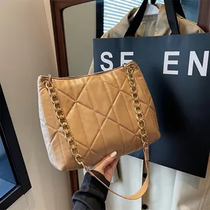Chic quilted khaki shoulder bag with gold chain strap and spacious tote design