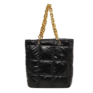 Chic black quilted tote bag with gold chain strap for women, stylish puffer style