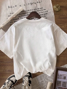 Back view of minimalist white oversized crew neck short sleeve cotton T-shirt