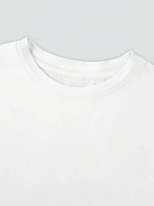 Detail showing the ribbed crew neck and double-needle stitching on white cotton T-shirt