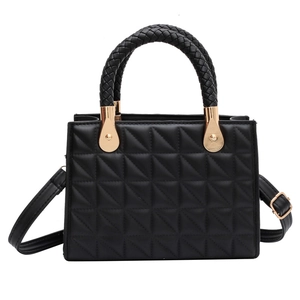 Classic black quilted small square handbag with woven handle and gold hardware detail