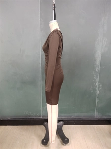 Detailed side view of brown ruched long sleeve bodycon dress on a mannequin