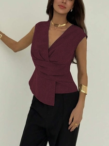 Women's burgundy V-neck sleeveless top with wrap pleated design and asymmetric hem
