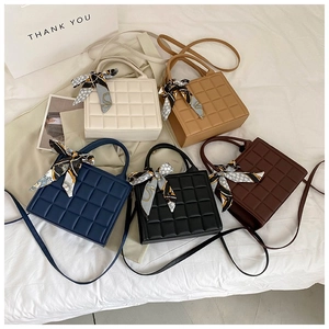 Collection of checkered tote bags in five colors with decorative silk scarves and straps