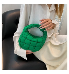 Chic quilted bright green cloud bag in high-density nylon with puff shoulder strap