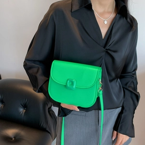 Fashionable bright green leather saddle bag with square buckle and slim shoulder strap