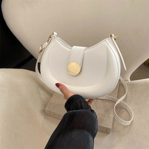 Minimalist white half-moon shoulder bag with premium golden buckle and matte leather finish