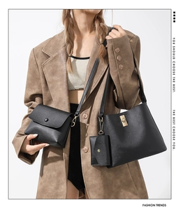 Three-piece black leather bucket bag set shown with urban casual outfit styling