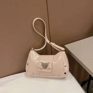 Fashionable light pink leather shoulder bag with heart buckle and silver rivets decoration