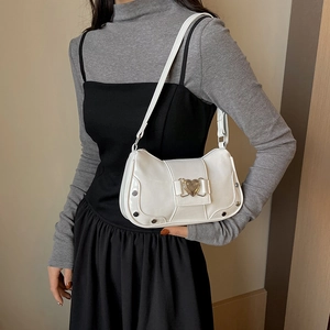 White shoulder underarm bag with gold heart buckle and silver rivets for casual style