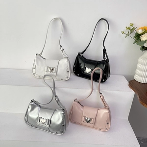 Hobo shoulder bag with heart buckle and studs in white black silver and pink