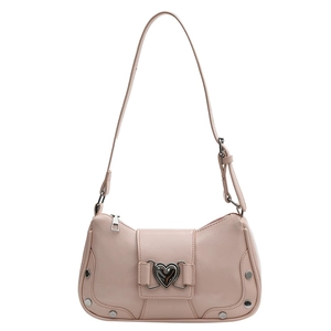 Pink faux leather hobo bag with heart buckle and silver rivets on white background