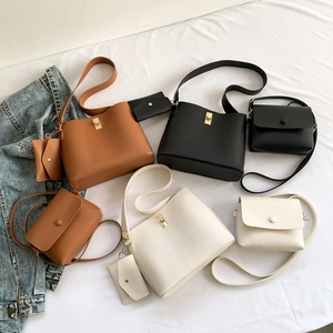 Three-piece vintage bucket bag set for women with matching crossbody bags in neutral colors