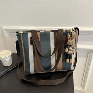 Canvas striped tote bag with adjustable strap and cute rabbit pendant for women
