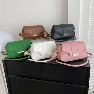 Chic women's leather crossbody bags in five colors with gold chain straps and metal decor