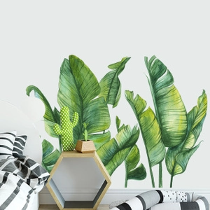 Macro detail of tropical banana leaf wall sticker with watercolor texture in a bedroom