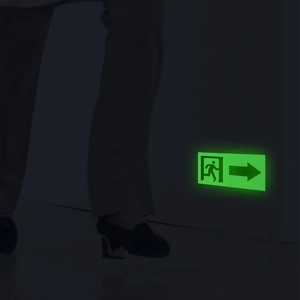 Luminous glow-in-the-dark emergency exit sign sticker with running figure and arrow