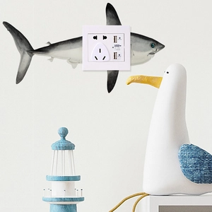 Detail of white dual USB wall socket with 2100mA output for underwater themed rooms