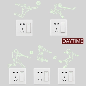 Luminous sports wall stickers featuring five athletic silhouettes around light switches