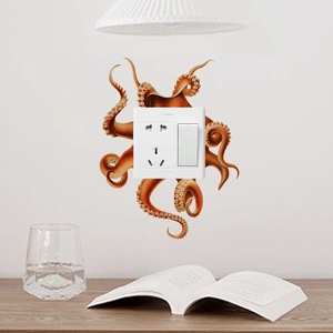 Detail of octopus tentacle wall sticker decorating a white light switch in a modern room