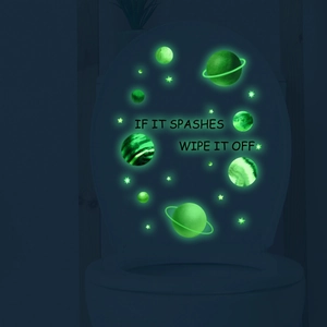 Luminous solar system toilet stickers with planets stars and decorative text in the dark