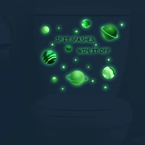 Luminous solar system toilet stickers featuring glowing planets and stars in the dark
