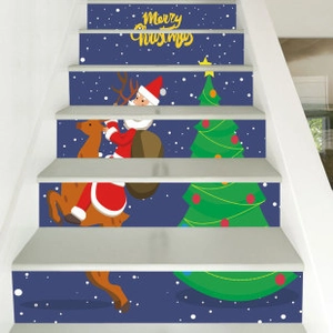 Detail of Christmas stair stickers featuring Santa, reindeer, and Merry Christmas text