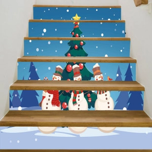 Christmas staircase stickers featuring snowmen and decorated holiday trees on blue background