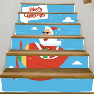 Christmas staircase decals set featuring Santa Claus flying a plane with festive blue sky