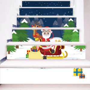 Macro view of Christmas staircase stickers featuring Santa Claus and reindeer in snowy forest