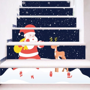 Detail of Christmas stair stickers featuring Santa, reindeer and snowflakes on steps