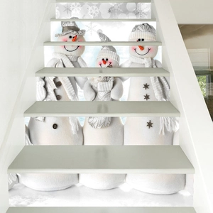 Close-up of PVC Christmas stair stickers featuring snowman family with grey hats and scarves